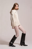 First Born Knits DAFNE knitted sweater in cozy, textured fabric, featuring a classic fit and ribbed cuffs.