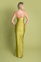 Laura Escobar pistachio maxi dress in soft, flowy fabric, featuring a stylish silhouette perfect for elegant summer occasions.