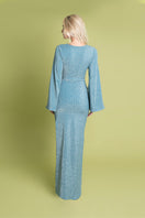 Blue Centella Maxi Dress by Laura Escobar, flowing fabric and elegant design, shown on a model.