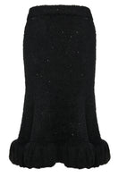 Black high-waisted knitted midi skirt by Lalo, showcasing a textured fabric and stylish silhouette.
