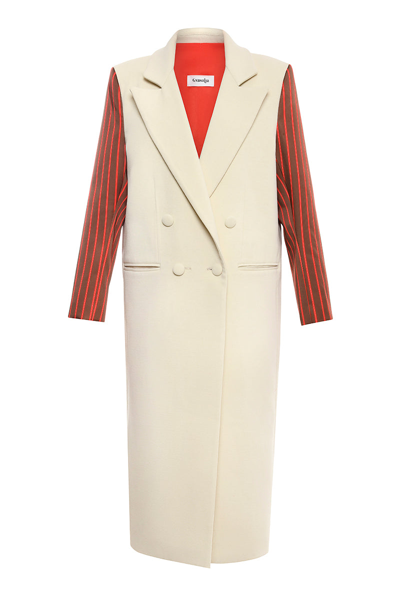 Gvasalia double breasted coat with striped sleeves, tailored fit, and classic design, displayed on a hanger.