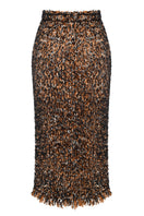 Lalo midi skirt with high-waisted knitted texture, showcasing soft fabric and stylish design perfect for casual or chic outfits.