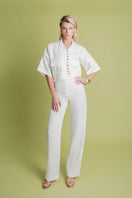 White Lina shirt by Laura Escobar, showcasing a stylish, tailored button-up shirt with a classic collar and clean design.