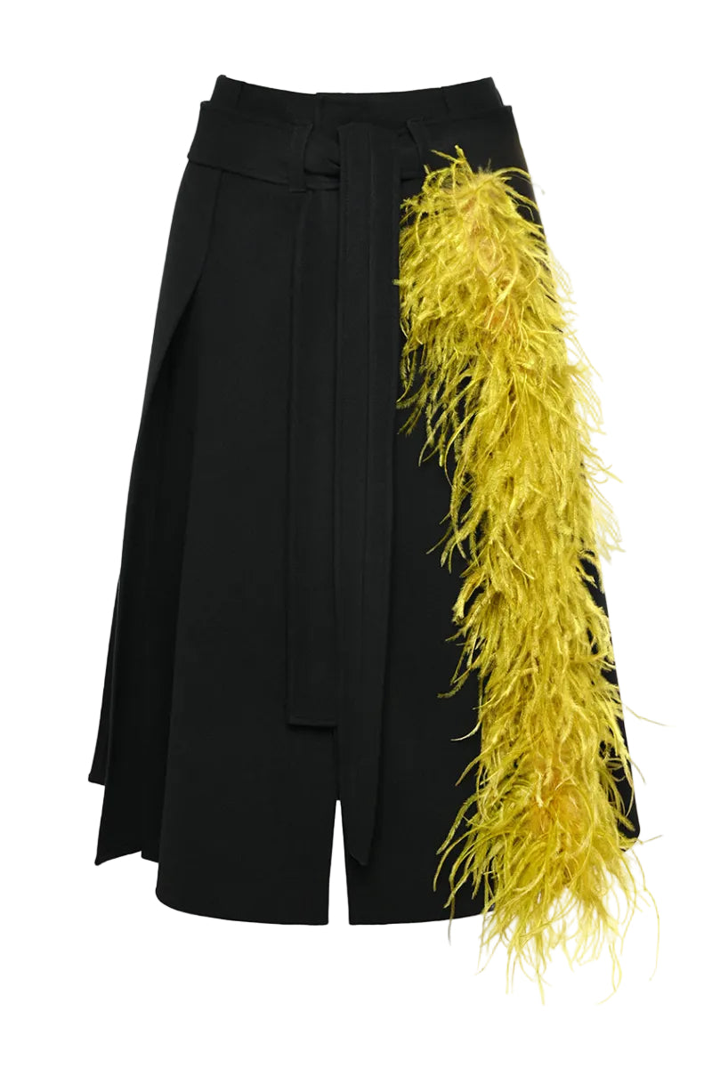 Lalo high waisted knitted midi skirt with gold textured pattern, showcasing its elegant length and stylish design.