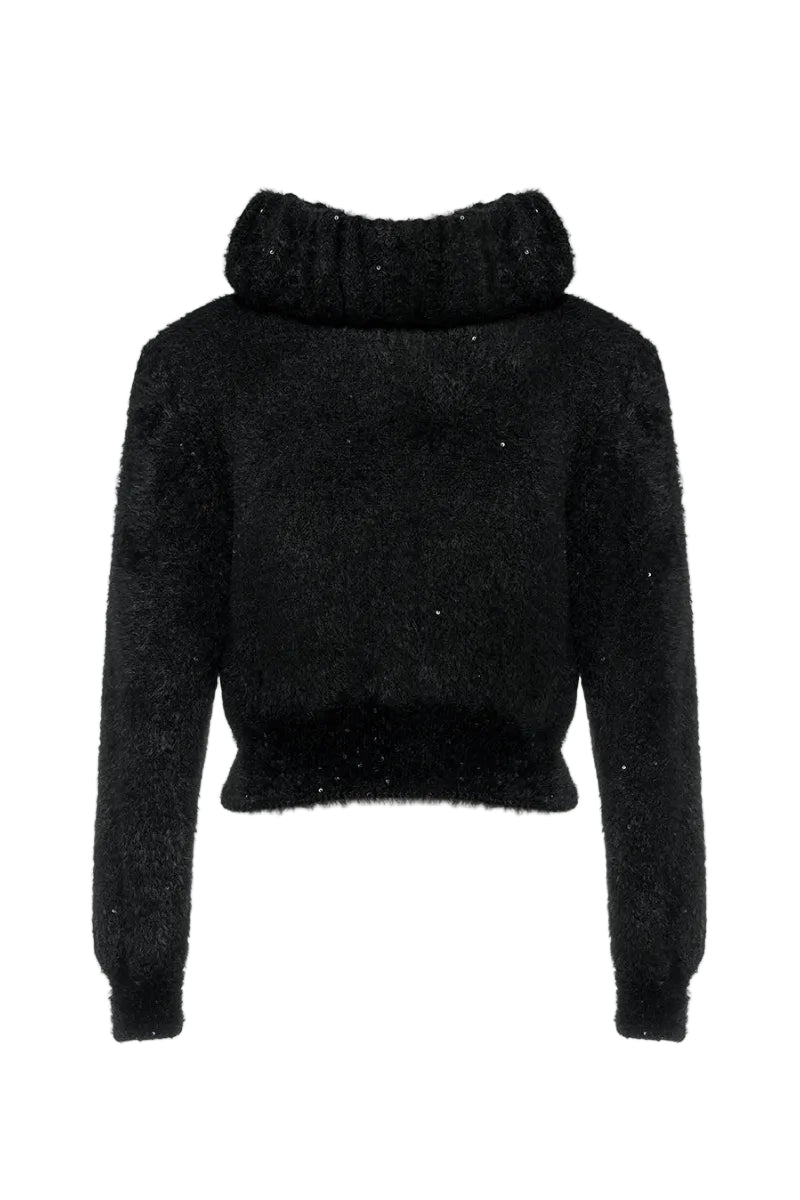 Lalo oversized black knitted sweater with soft ribbed texture, cozy and relaxed fit, displayed on a hanger.