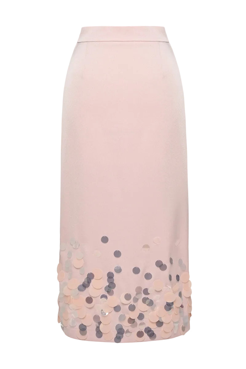 Pink midi knitted skirt with embellishment detailing by Lalo, featuring a flowy maxi skirt design and textured knit fabric.