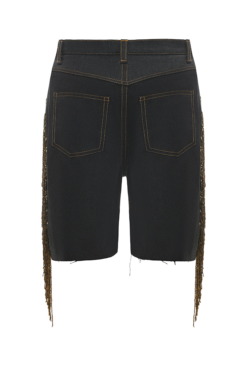Gvasalia denim shorts with beaded fringe, featuring distressed fabric and stylish fringe detailing on the hem.