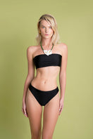 Black Lirio bikini by Laura Escobar displayed on a model, featuring a stylish two-piece bikini with sleek design and minimalistic details.
