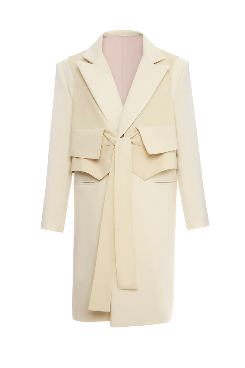 Gvasalia double-breasted coat with attached vest, stylish winter outerwear, tailored fit, in classic neutral color.