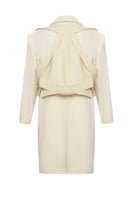 Gvasalia double-breasted coat with matching vest, tailored fit, in a neutral color, displayed on a hanger.