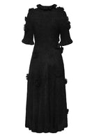 Black Lalo draped A-line maxi dress with floral details, featuring a flowing silhouette and elegant design.