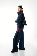 Gvasalia two-tone puffer coat with double collar detail, stylish winter outerwear, shown from the front in the image.