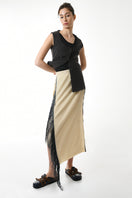 Gvasalia double-breasted midi skirt with beaded fringe detailing, showcasing a stylish and elegant design.