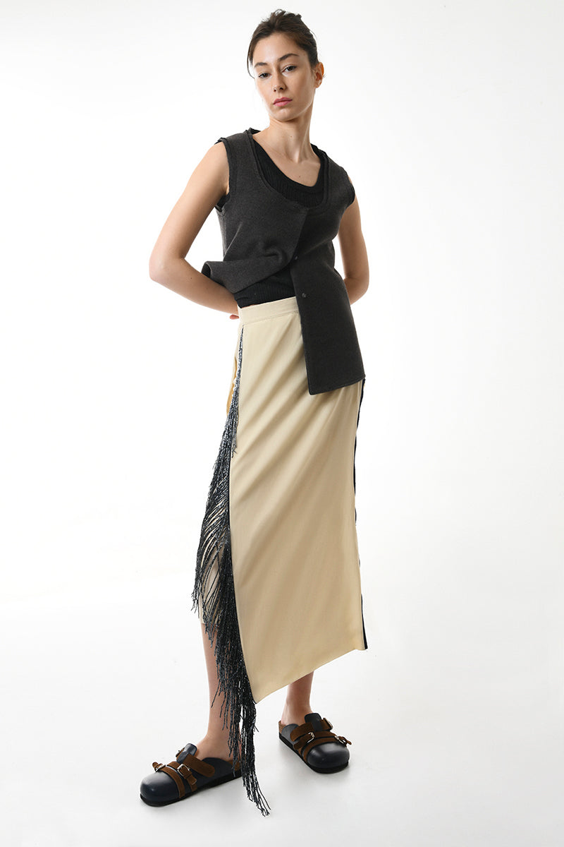 Gvasalia double-breasted midi skirt with beaded fringe detailing, showcasing a stylish and elegant design.