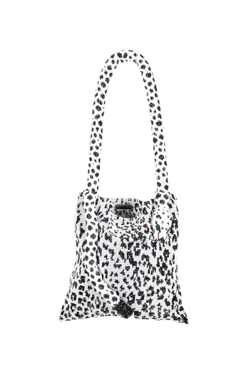 Snow leopard print SAC DE SOUL Serpent shoulder bag with a sleek design and chain strap, stylish accessory for everyday use.