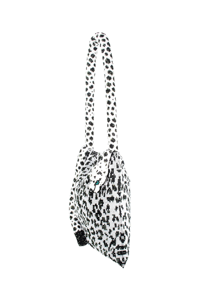 Snow leopard print SAC DE SOUL Serpent shoulder bag with adjustable strap, stylish and spacious for everyday use.