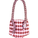 Pink Serpent Mini shoulder bag by SAC DE SOUL, featuring a sleek design and textured serpent pattern.