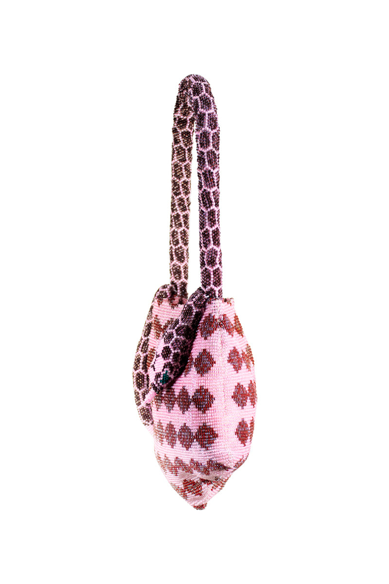 Pink SAC DE SOUL Serpent Mini shoulder bag with sleek design and gold chain strap, stylish accessory for everyday wear.