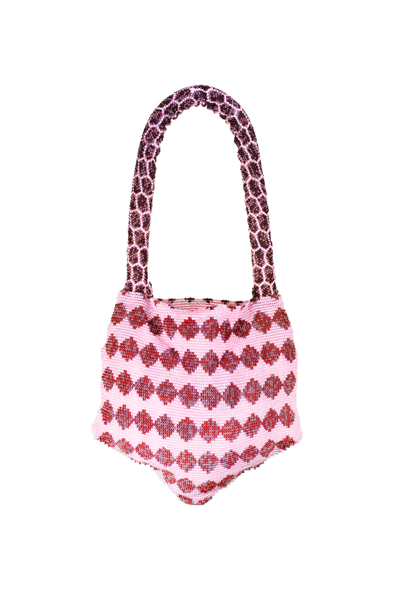 Pink Sac de Soul Serpent Mini shoulder bag with sleek design and gold hardware, shown in a stylish close-up shot.