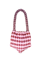 Pink Serpent Mini shoulder bag by SAC DE SOUL with a sleek, compact design and stylish snake-inspired pattern.