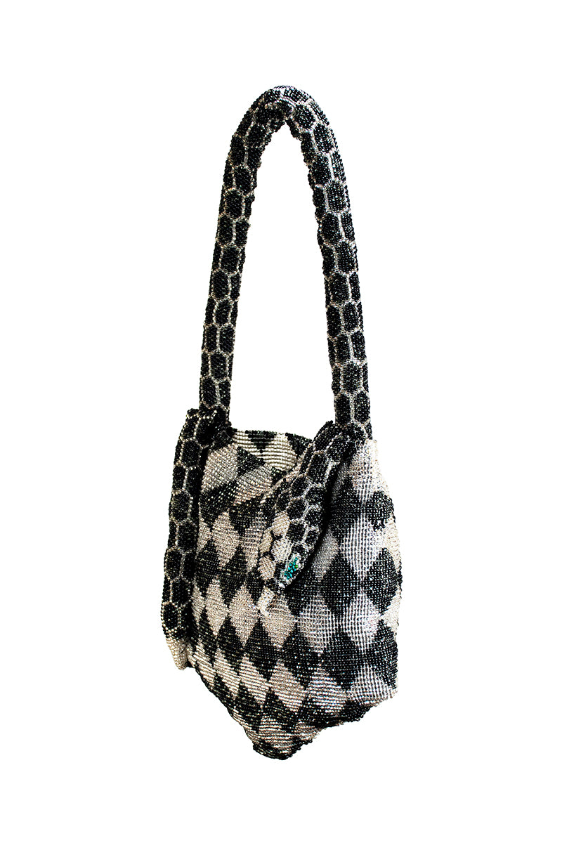 Black and silver Serpent Mini shoulder bag by SAC DE SOUL, featuring sleek design and compact size.