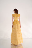Yellow V-neck maxi dress by Happy Clothing, flowing fabric and sleeveless design, perfect for casual or summer wear.