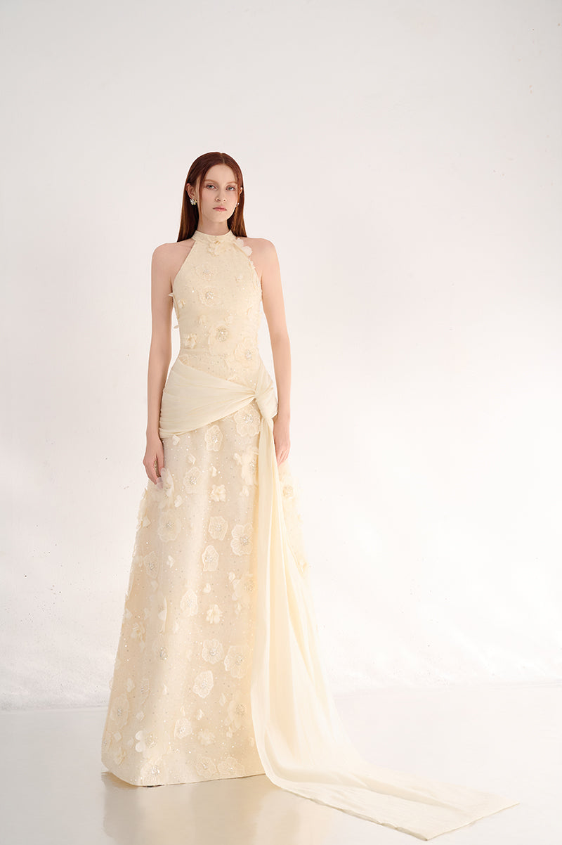 Elegant halter neck gown with floral details by Happy Clothing, showcasing a flowing fabric and intricate flower embroidery.