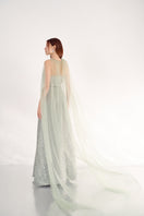 Dark mint pearl gown with scarf detail by Happy Clothing, featuring elegant fabric and flowing silhouette.
