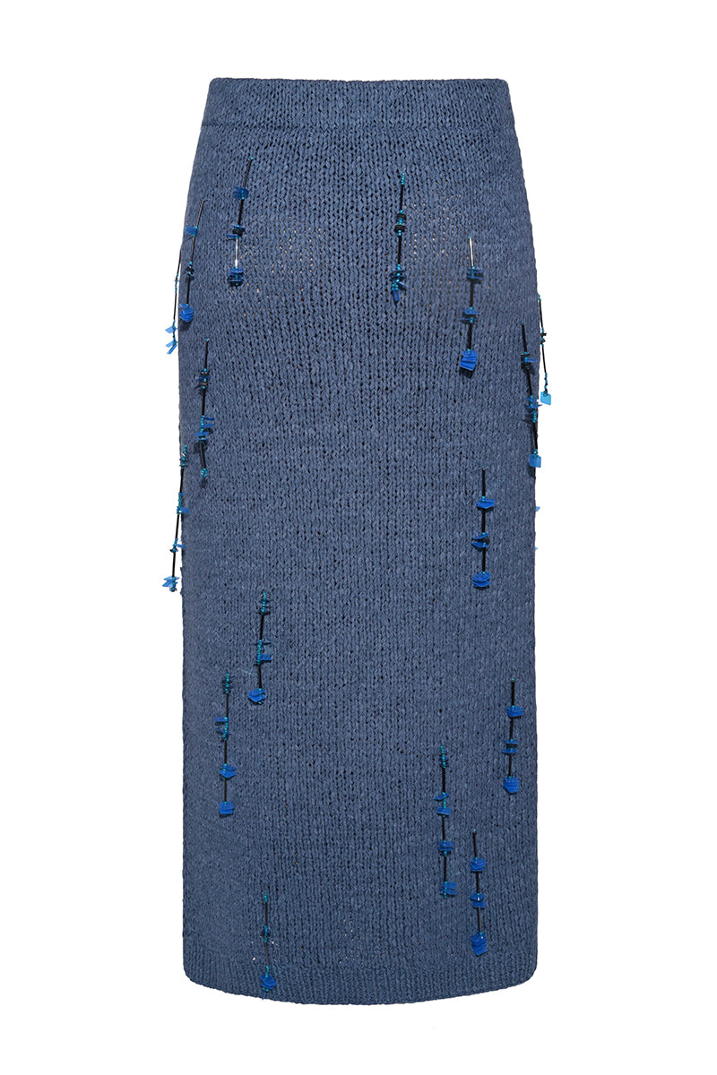 Lalo hand-knit blue maxi pencil skirt with embellishments, featuring intricate knitting and decorative details.