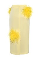 Lalo butter yellow midi pencil skirt with feather details, fitted design, and side slit, styled for elegant fashion.