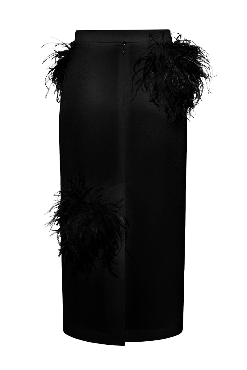 Black Lalo midi pencil skirt with feather details, fitted style, and high waist, shown on a model.