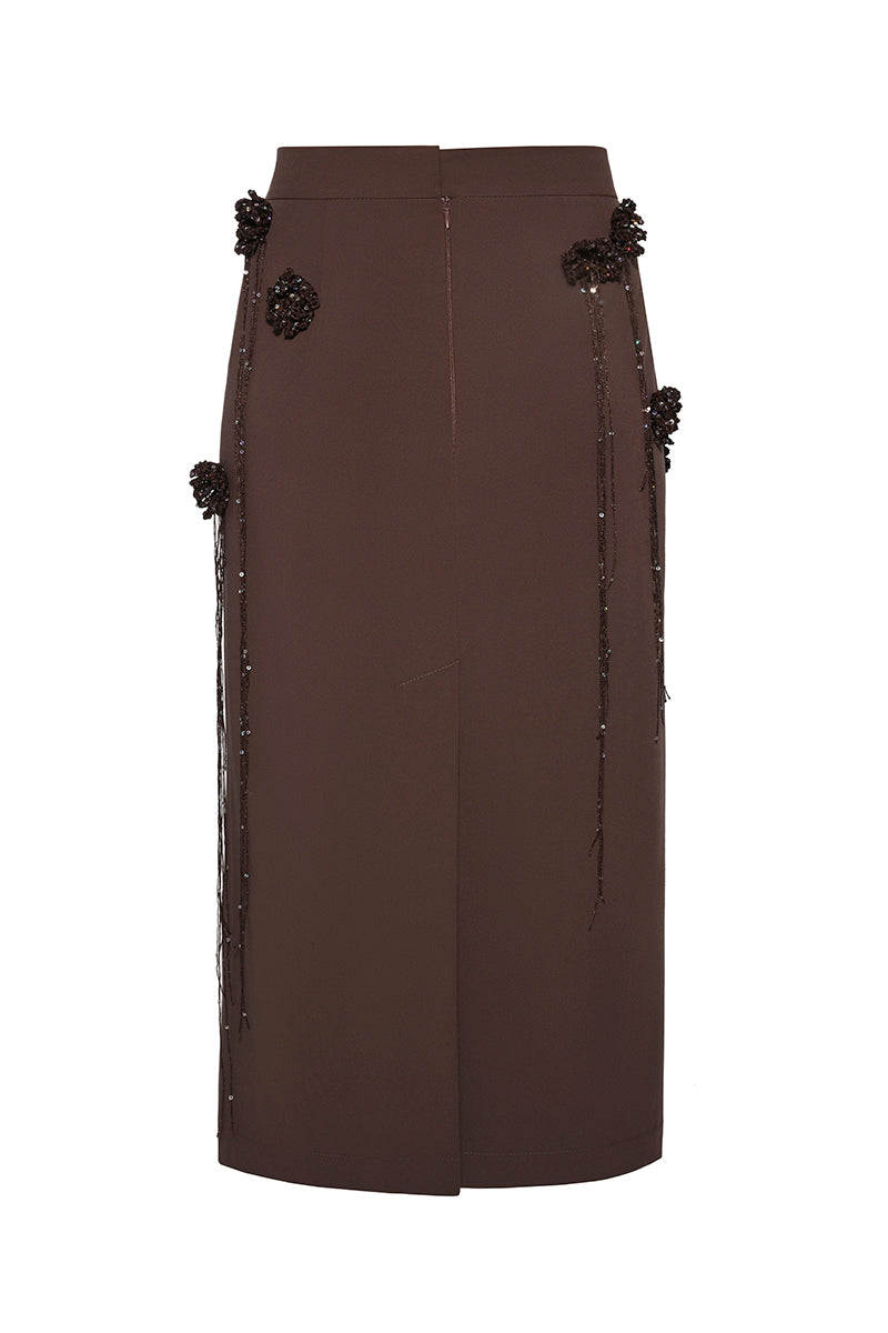 Lalo maxi pencil skirt with knitted flower details, featuring a fitted silhouette and floral accents, stylish and elegant.