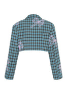 Gvasalia double-breasted cropped blazer in teal and pink with bow tie detail, stylish jacket for a modern, chic look.