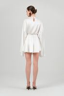 White Nina dress by Izakova, a stylish mini dress with a fitted silhouette and elegant design.