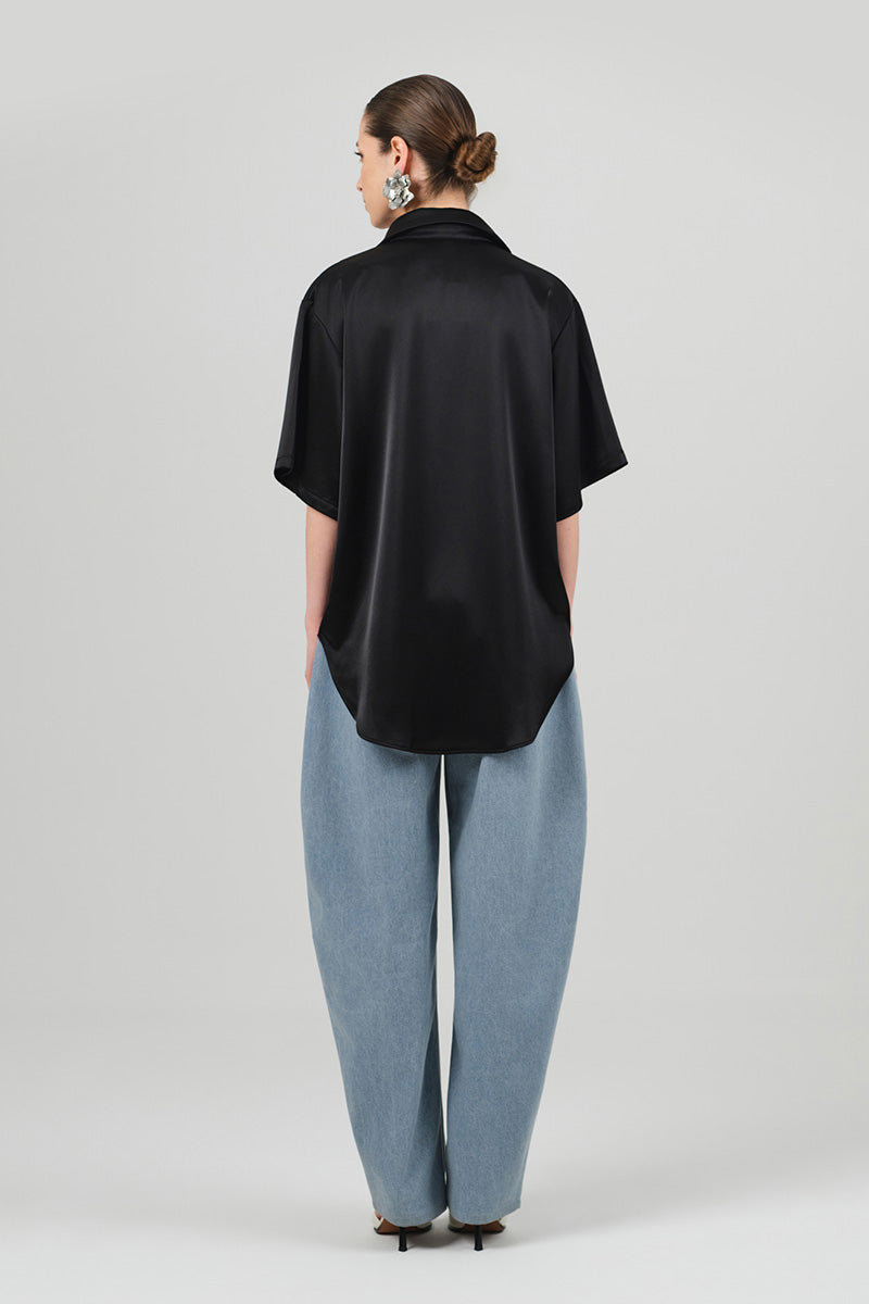 Black satin Rosa shirt by Izakova, showcasing smooth fabric and tailored fit in a stylish, elegant design.