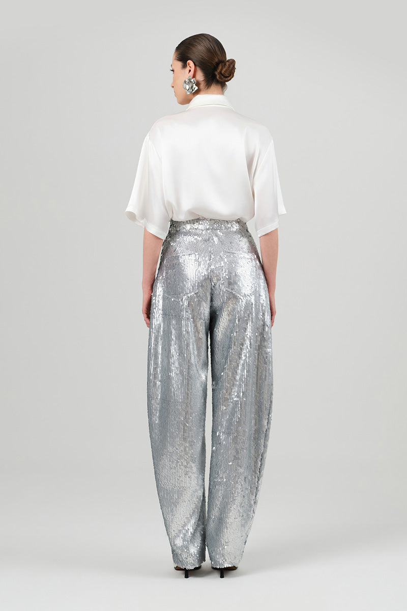 Izakova silver sequin jeans, stylish pants with shimmering sequins, designed for a fashionable and eye-catching look.