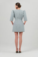 Izakova Mila blazer dress in washed blue, mini dress style with tailored fit and collar, displayed on a mannequin.