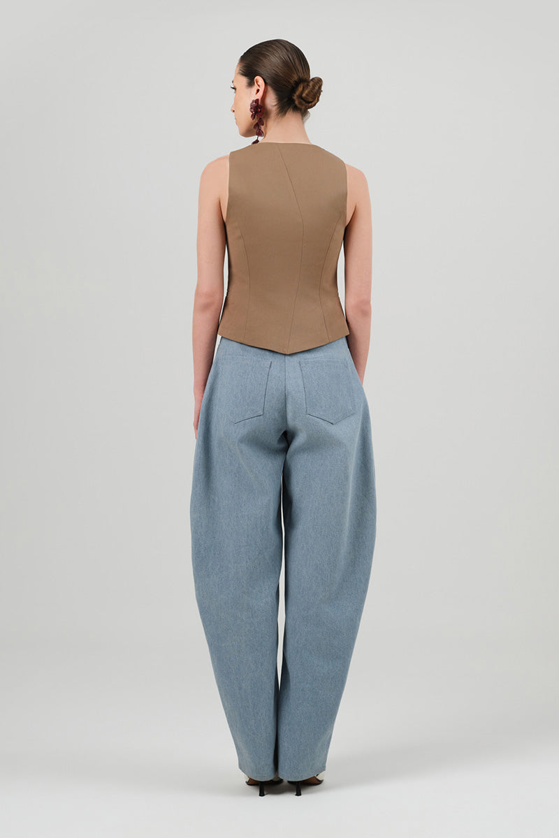 Izakova washed blue jeans, slim fit style, showcasing classic denim fabric and detailed stitching on a neutral background.
