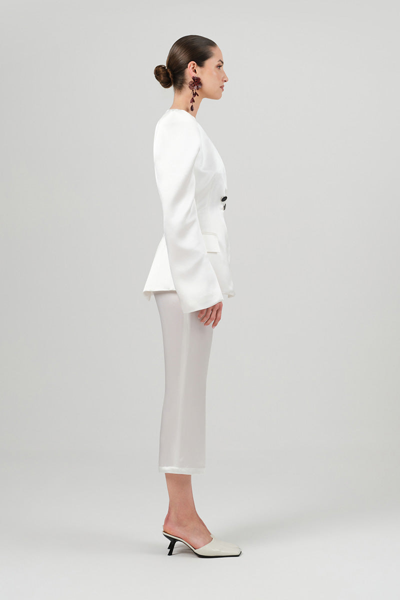 White satin Azera blazer by Izakova, tailored fit with sleek lapels, shown on a model.
