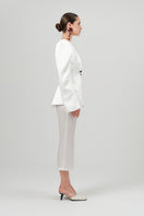 White satin blazer by Izakova, AZERA blazer with tailored fit and sleek design, shown on a model.