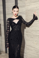 Black Avery floral lace cut-out midi dress by 21Six featuring intricate lace details and a stylish, elegant design.