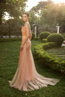 Elegant Capucine silk taffeta and tulle gown by 21Six, featuring flowing fabric and intricate detailing.