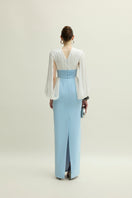 Elegant white and blue Duchess gown by Jenny K Tran, featuring intricate detailing and flowing fabric, perfect for formal occasions.