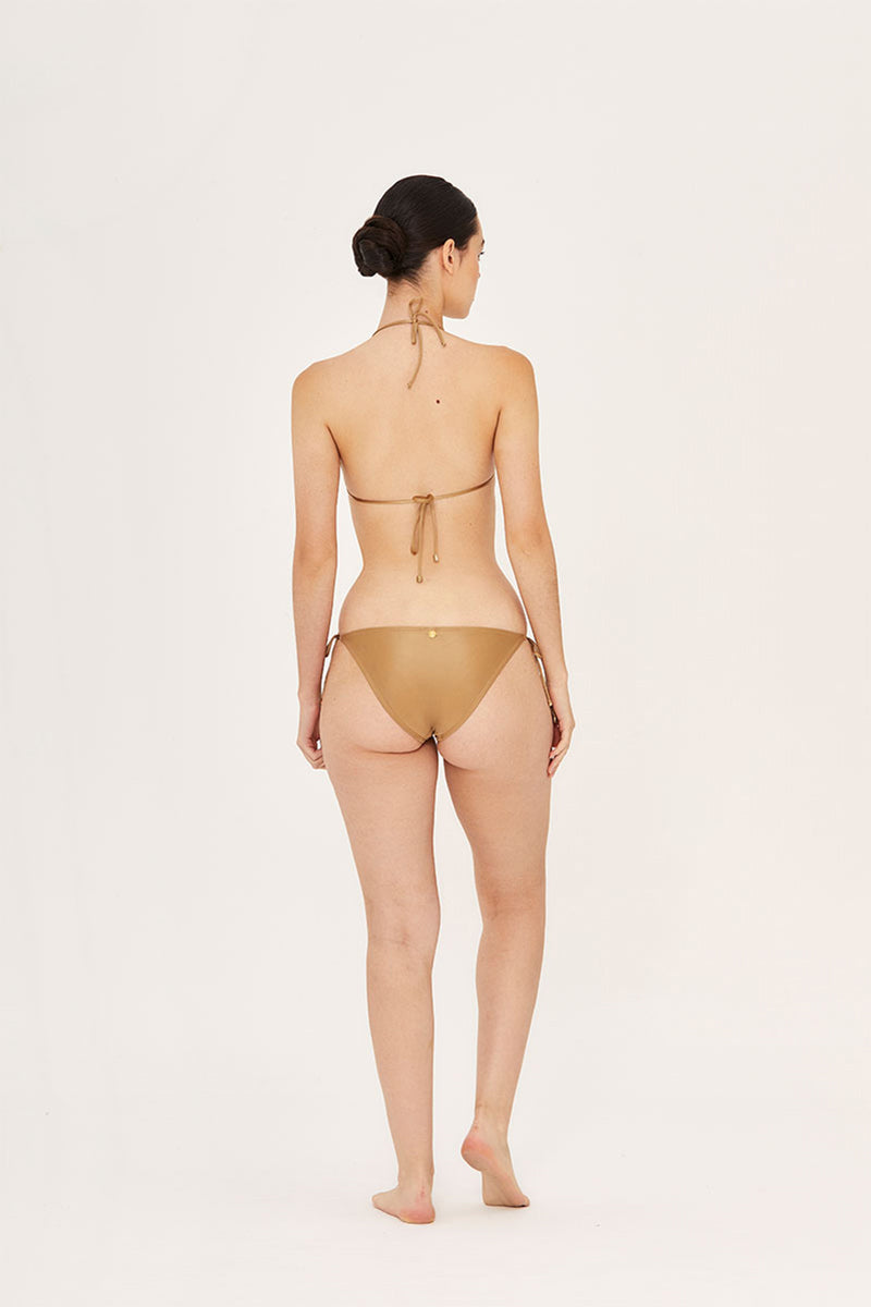 Aguaclara Dune side tie bikini bottoms in earthy tones, featuring adjustable side ties and a seamless fit.