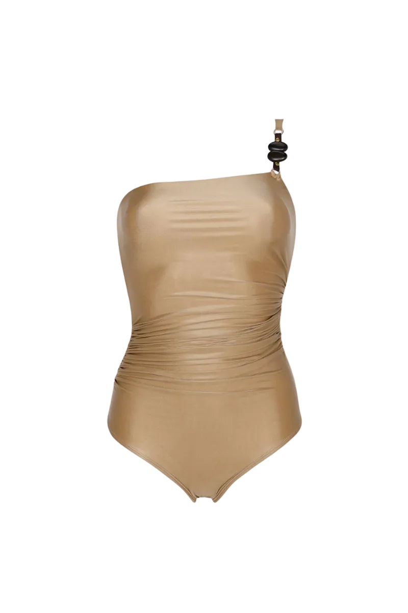 Aguaclara Dune one-shoulder one-piece swimsuit with a sleek design and neutral color, shown on a model.