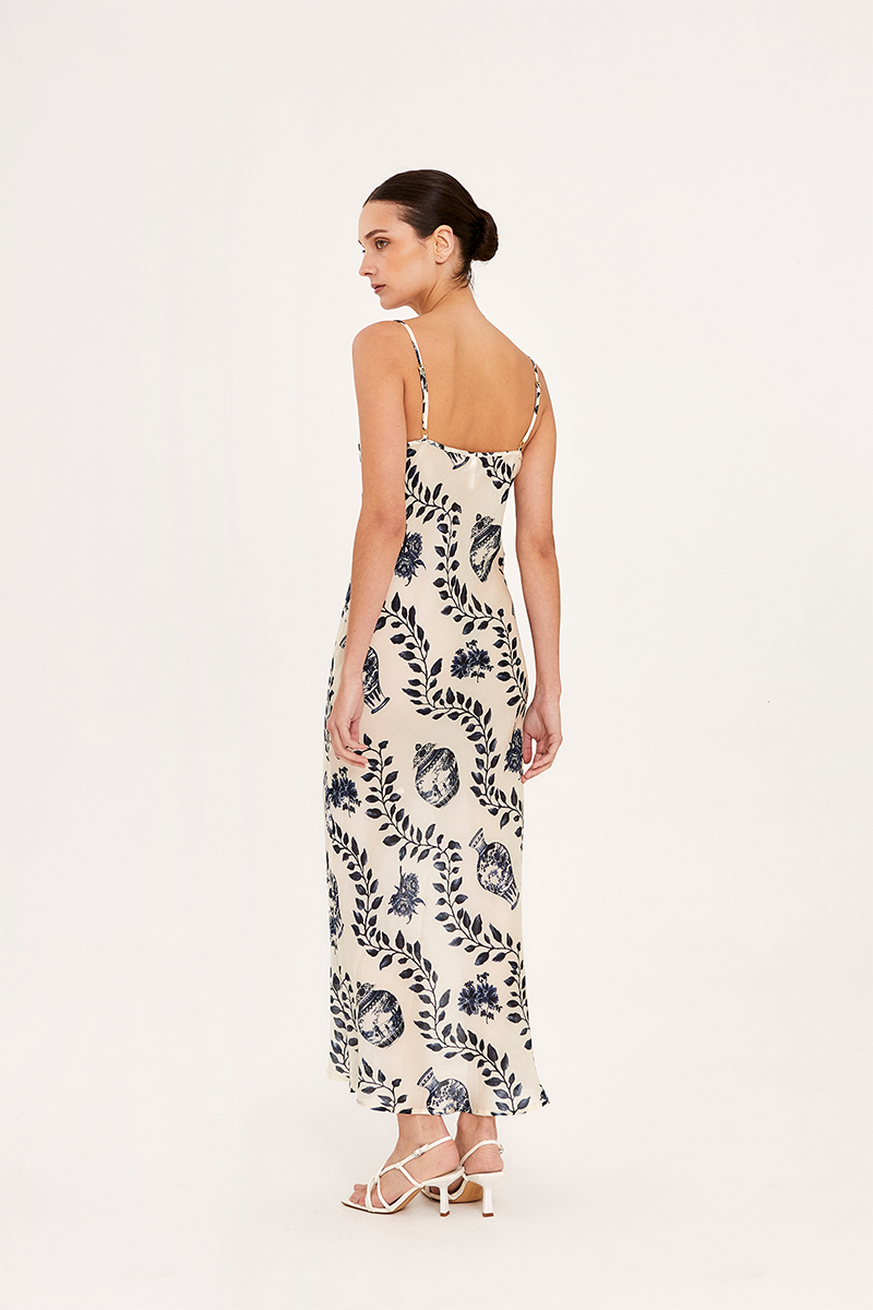 Aguaclara Dynastie Midi Slip Dress in soft fabric, featuring a relaxed fit and elegant design, perfect for casual or semi-formal wear.
