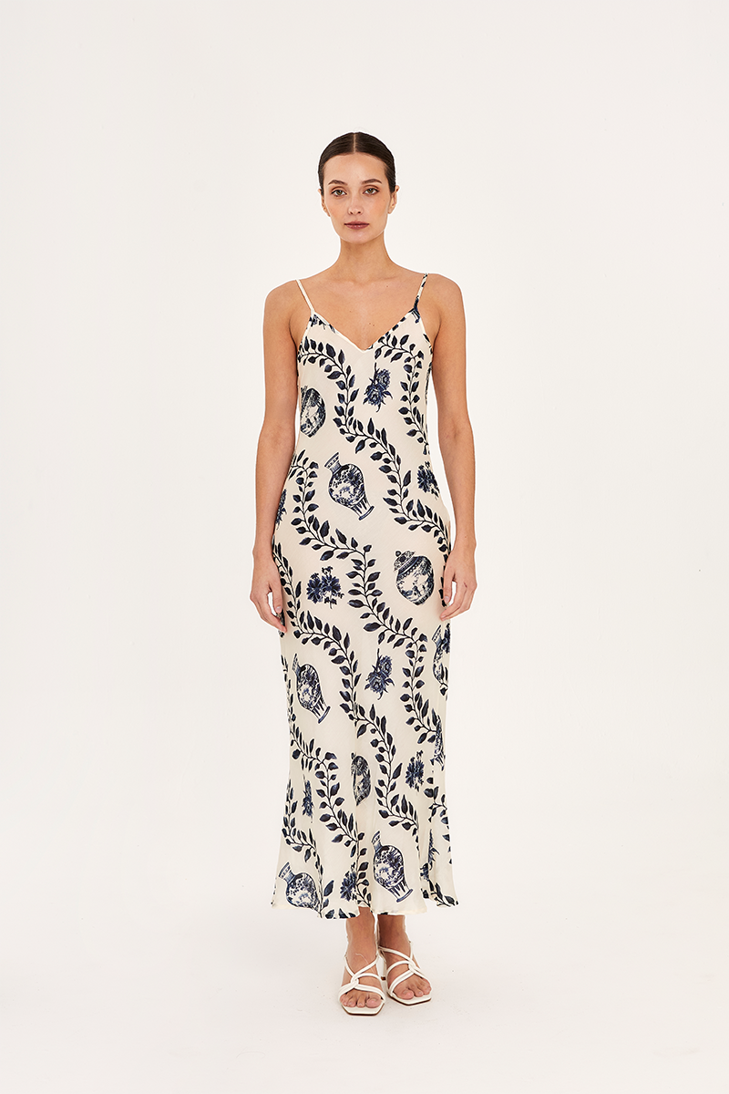 Aguaclara Dynastie midi slip dress in soft fabric, featuring a sleek silhouette and elegant design perfect for summer wear.