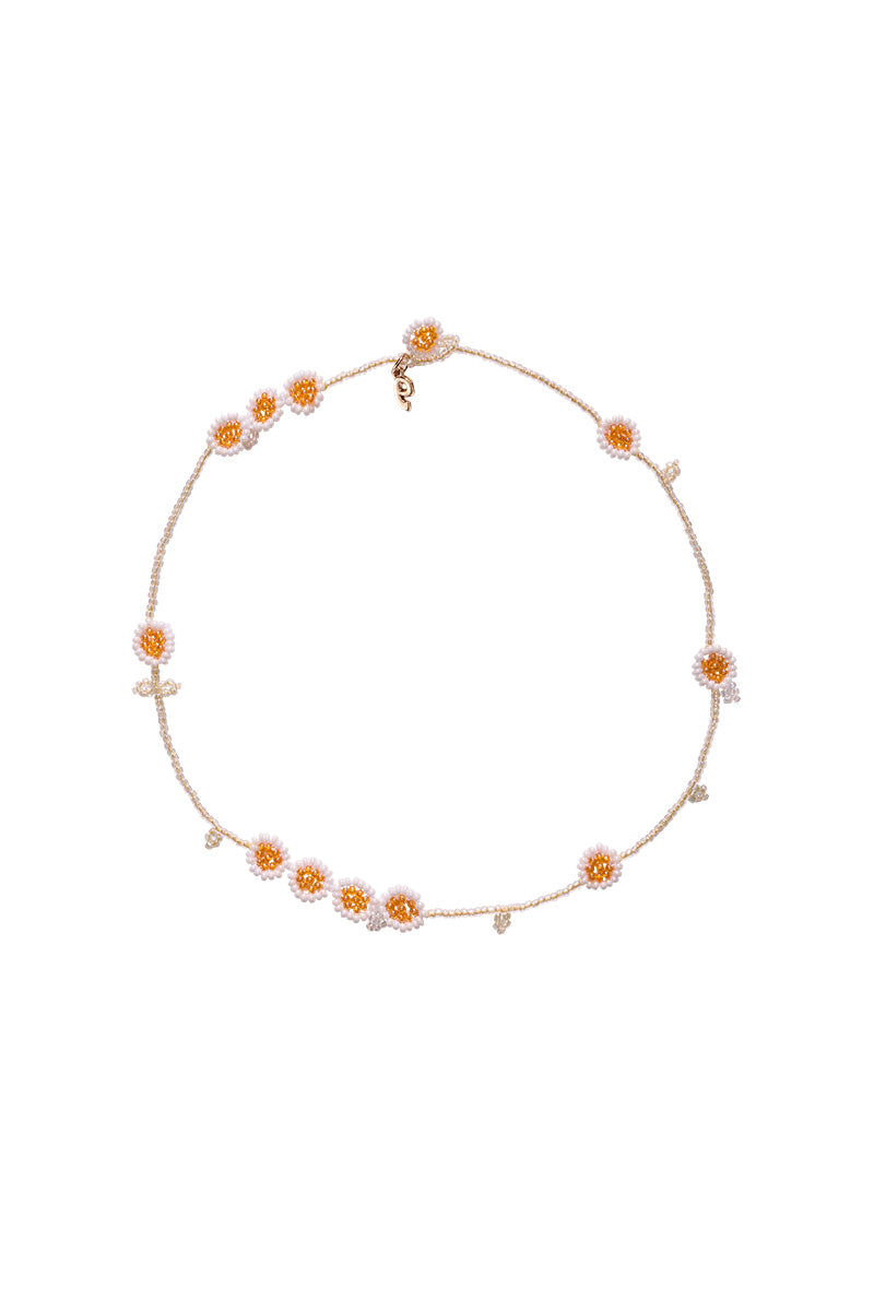 Pura Utz Daisy Flower Field Necklace featuring a delicate chain with a daisy flower pendant, perfect for spring and summer wear.