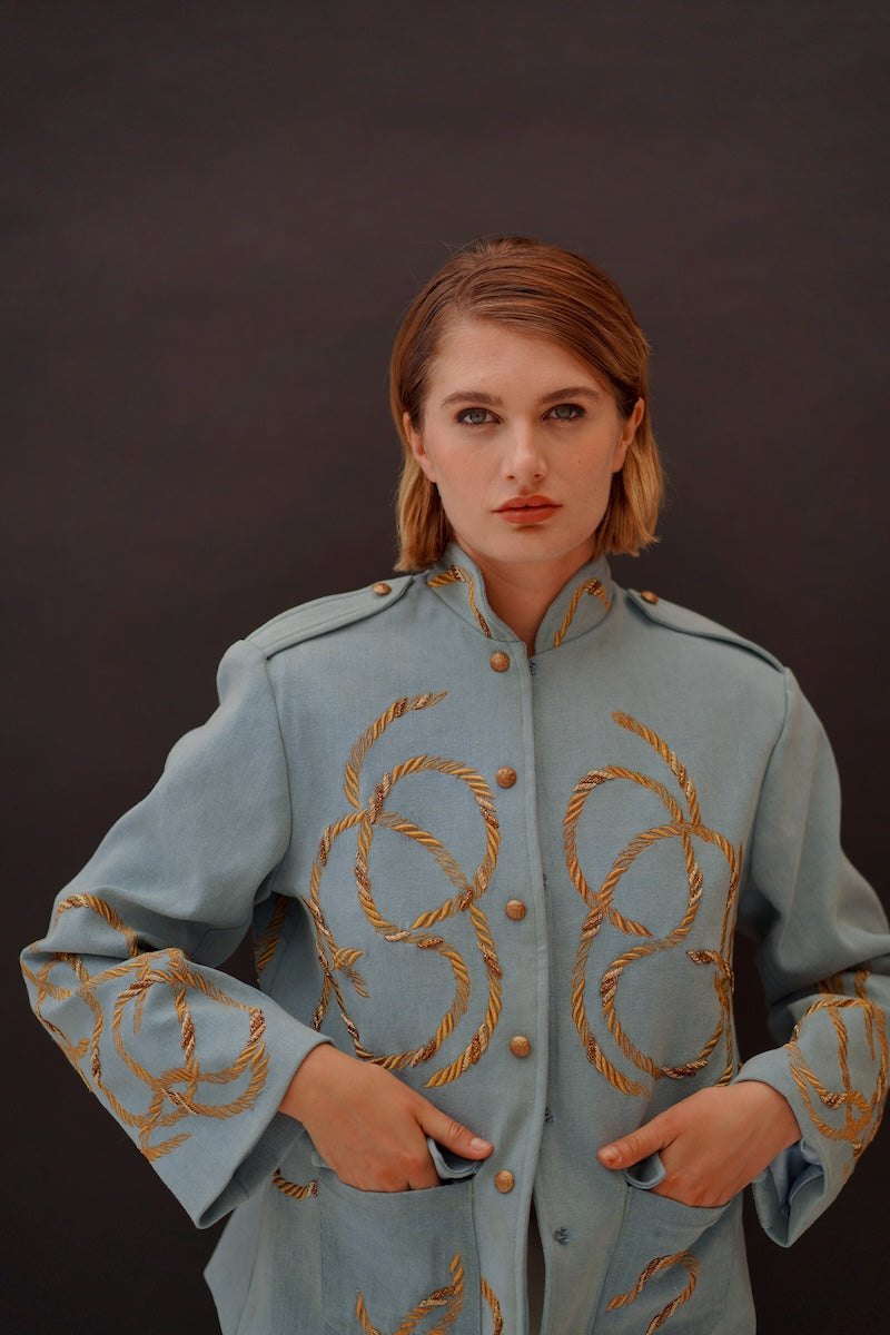 Nadya Shah Daley Denim Cargo jacket with front pockets and button details, featuring classic blue denim fabric.