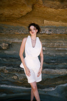Elegant ivory Dalia top by ANA + MARIA, showing a soft, sleeveless blouse with a relaxed fit and subtle detailing.